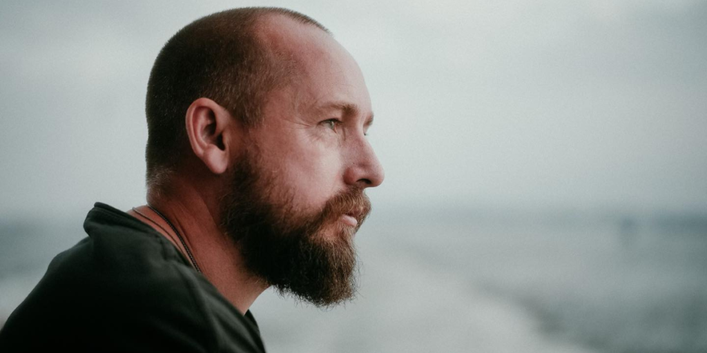 Side of the man's face looking ahead