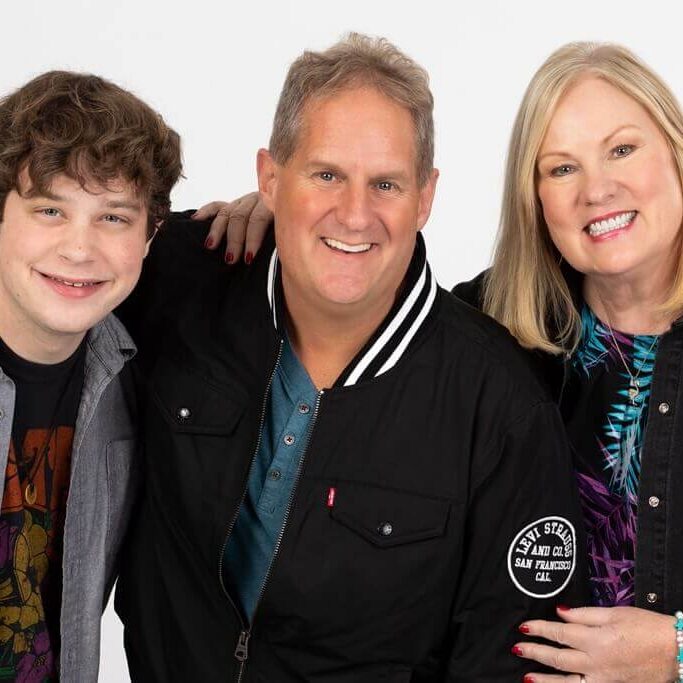 Smiling and posing for the photo: Keith Stevens, Pam Lundell and Keegan Goldfarb