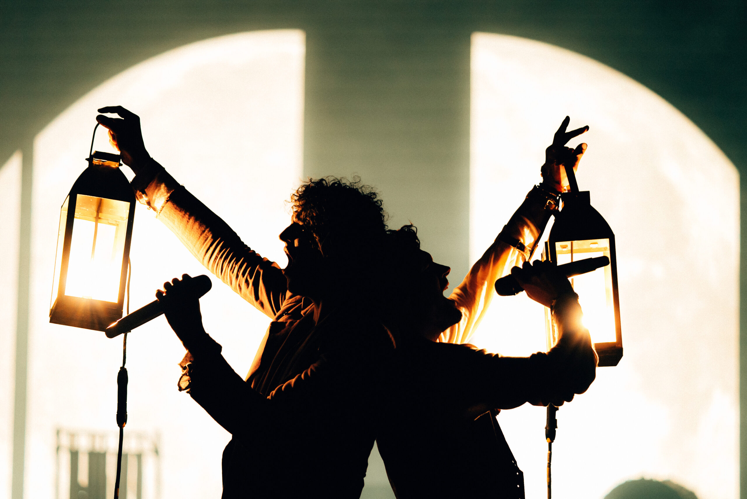 Image of for King + Country holding lamps